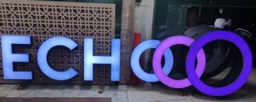 Illuminated logo lettering fabricated for an interior
