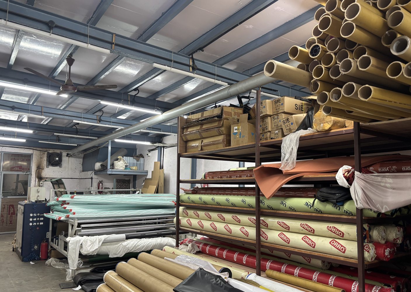 Flexible printing media and material rolls in organized storage