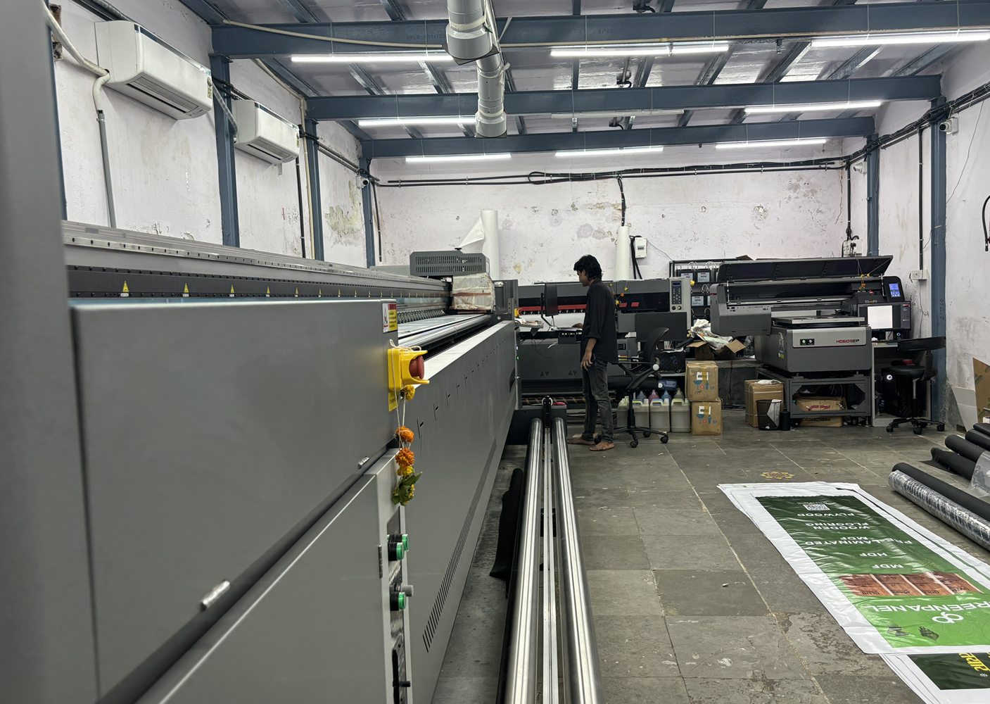 Wide-format printer producing large-scale graphics in our Mumbai facility